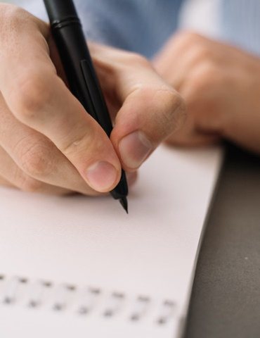 Copy drafting and markup at a desk