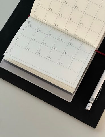 Planning a production batch on a desk calendar